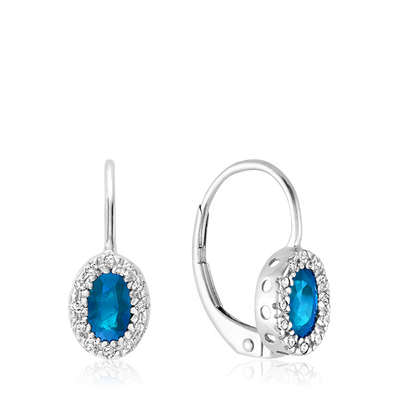 Boucles d'oreilles dormeuses halo de diamants et topaze bleue ovale